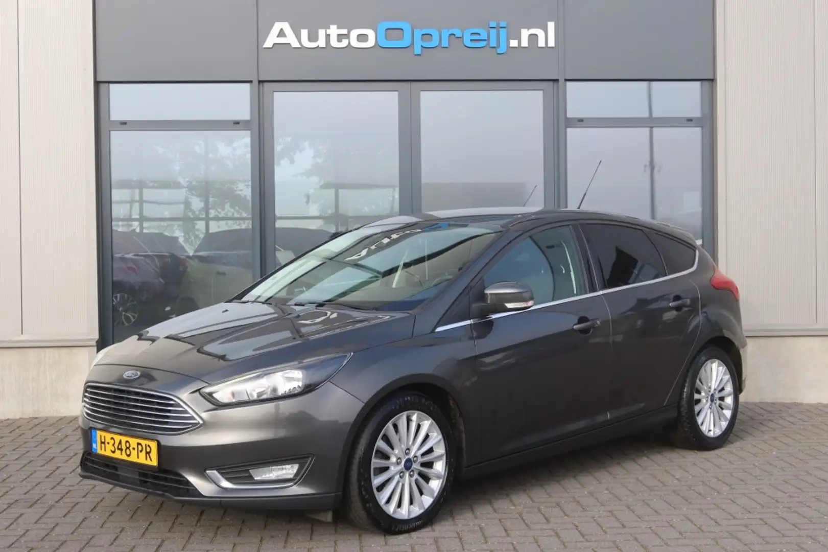 Ford Focus 1.5 Titanium 150pk Clima, NAVI, Winter Pack, Trekh Grijs - 1