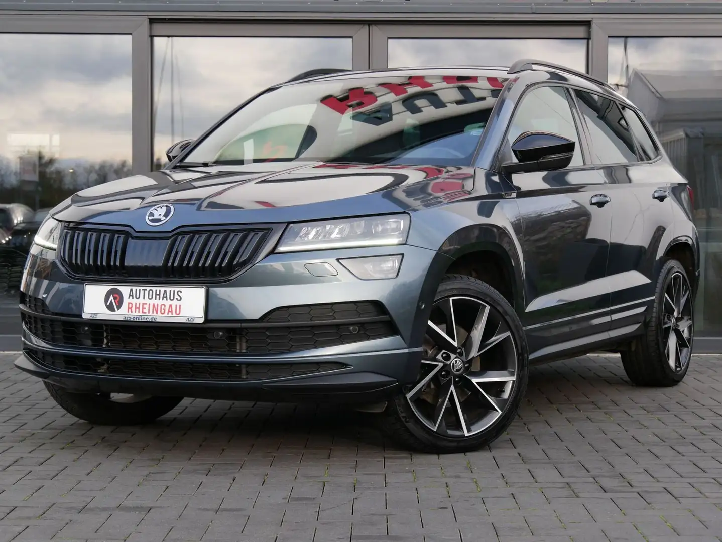 Skoda Karoq 2.0 TSI Sportline 4x4 OPF PANO/ACC/AHK Silber - 1