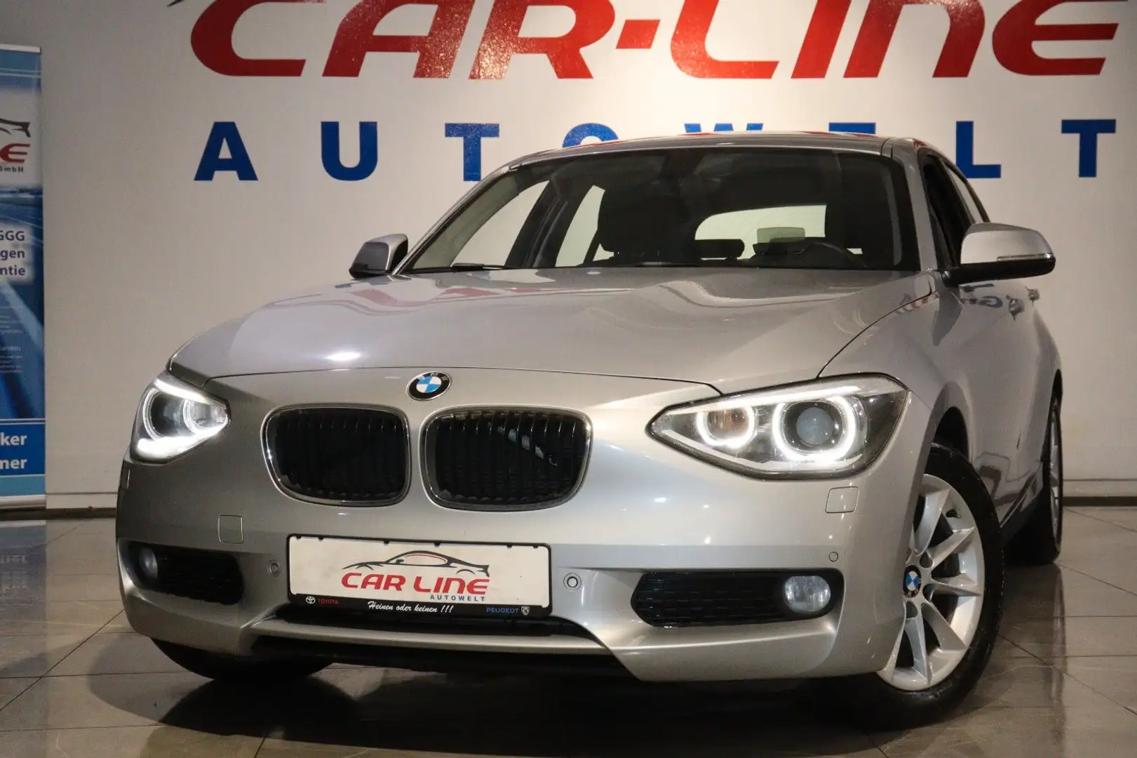 BMW 116 i Lim. 5-trg. *Xenon*Einparkhilfe*Alu* Silber - 1