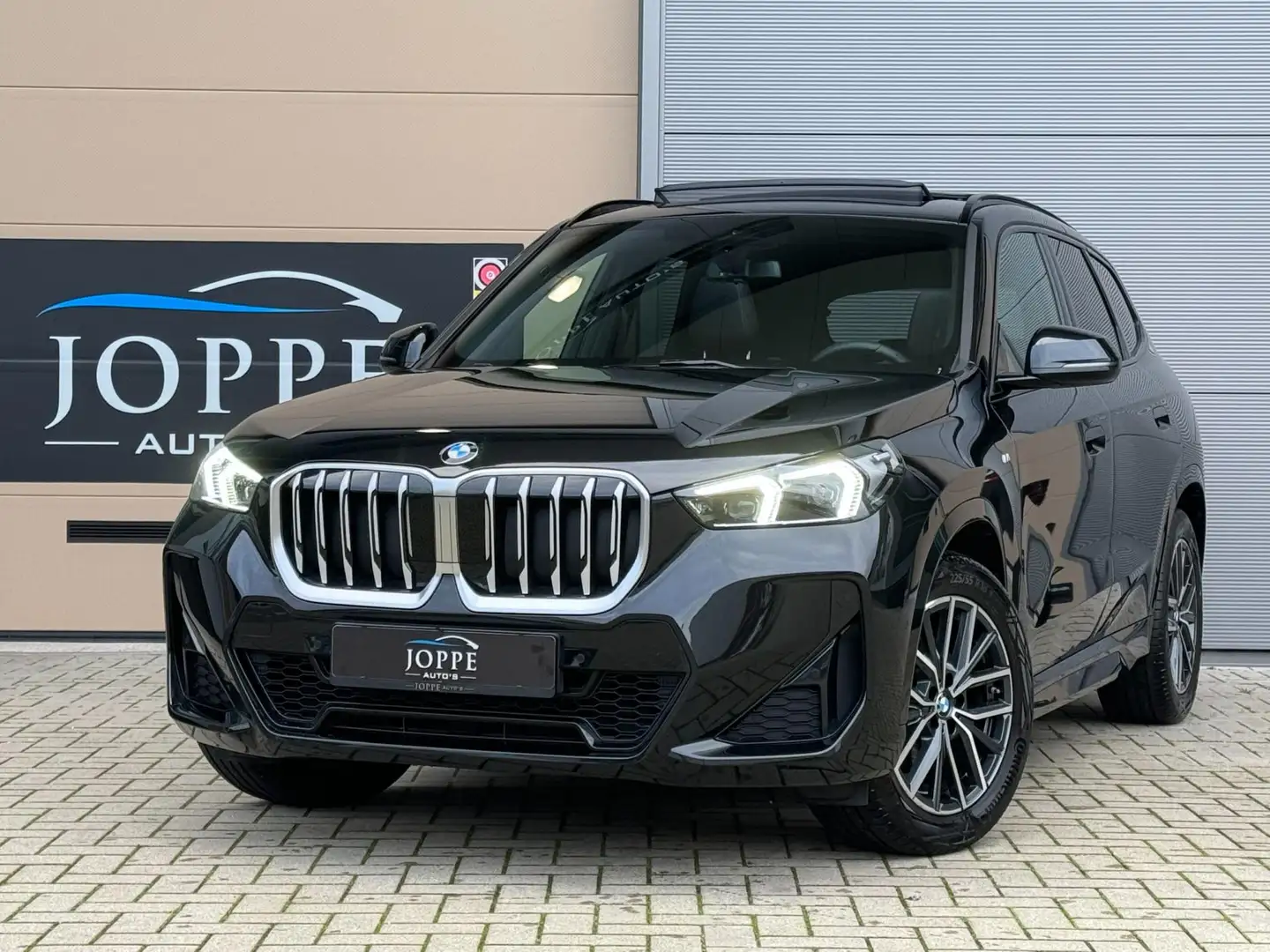 BMW X1 18i sDrive |M Sport|Pano|Leder|Shadowline| Zwart - 1