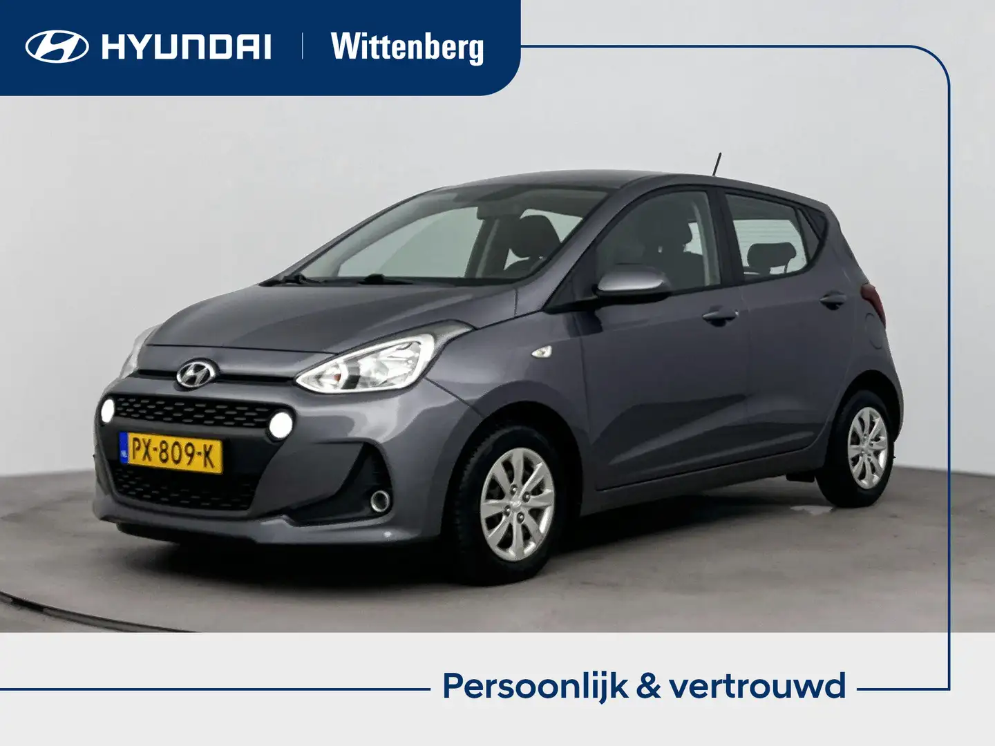 Hyundai i10 1.0i Comfort | Navi | Cruise | Airco | Stoel in ho Grijs - 1