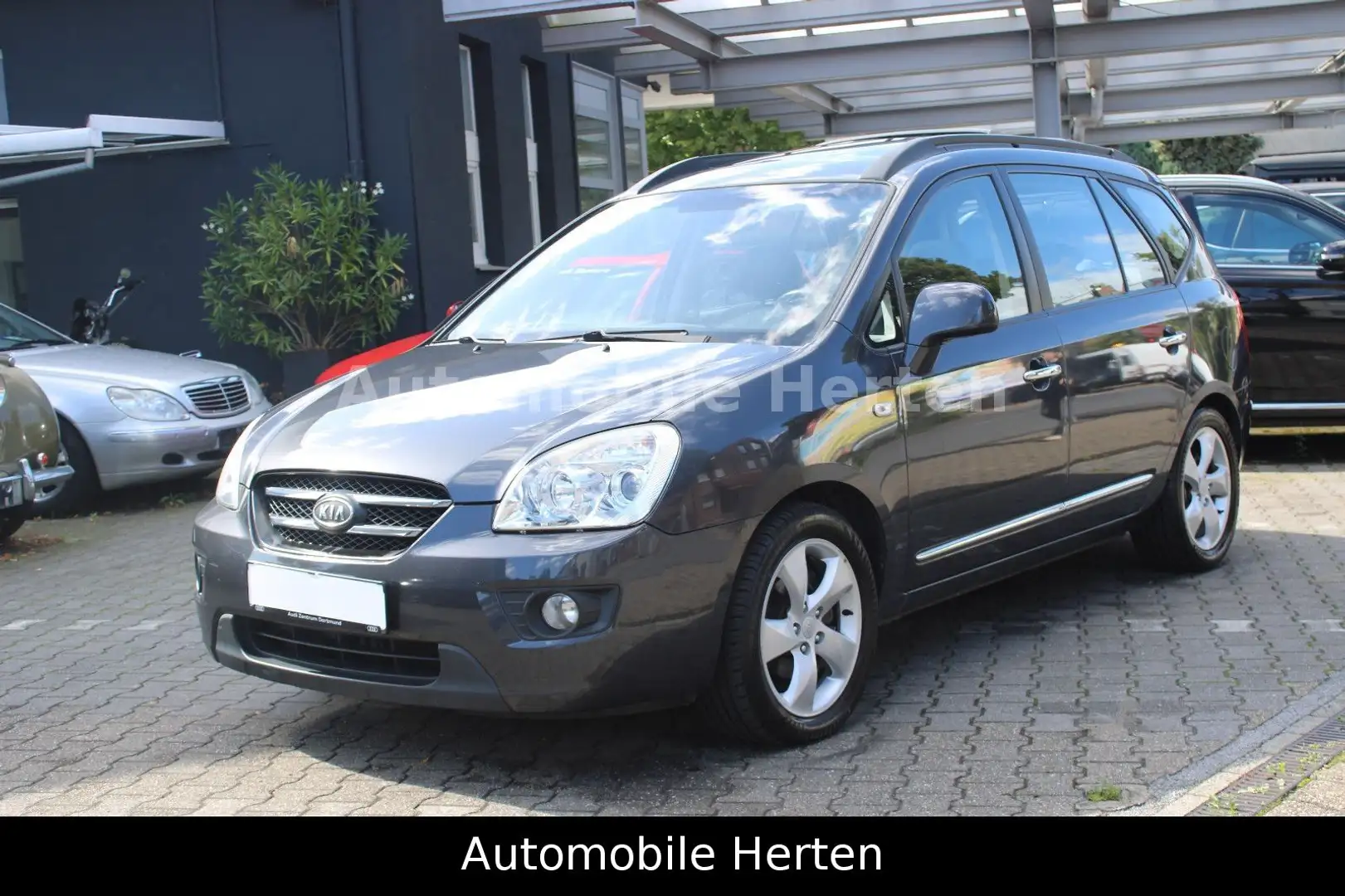Kia Carens 2.0 CRDi EX Top*LEDER*AHK*MJ:10*TÜV NEU* Grau - 1