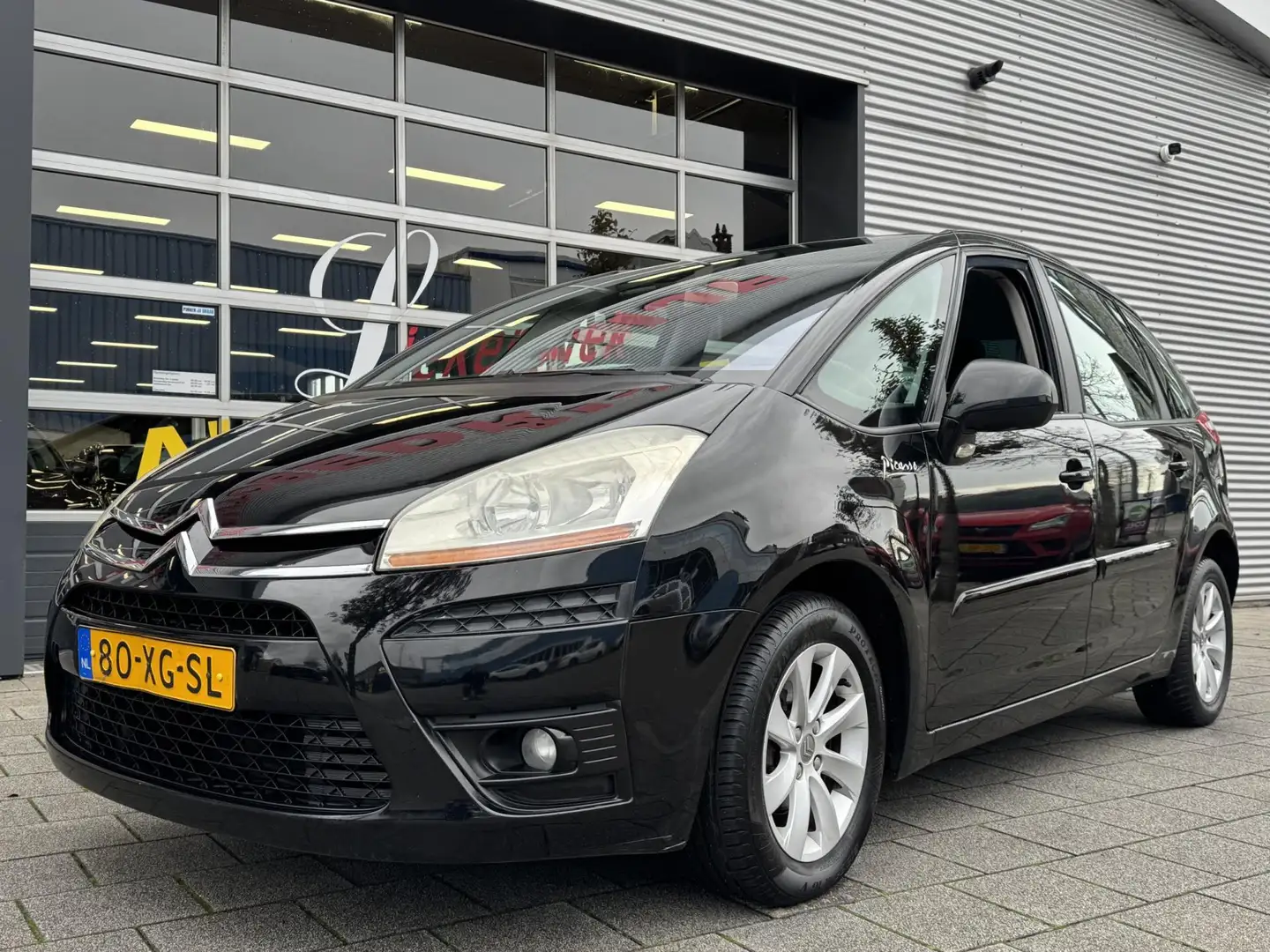 Citroen C4 Picasso 1.8-16V Ambiance 5p. - Airco/ECC I Sport velgen I Zwart - 1