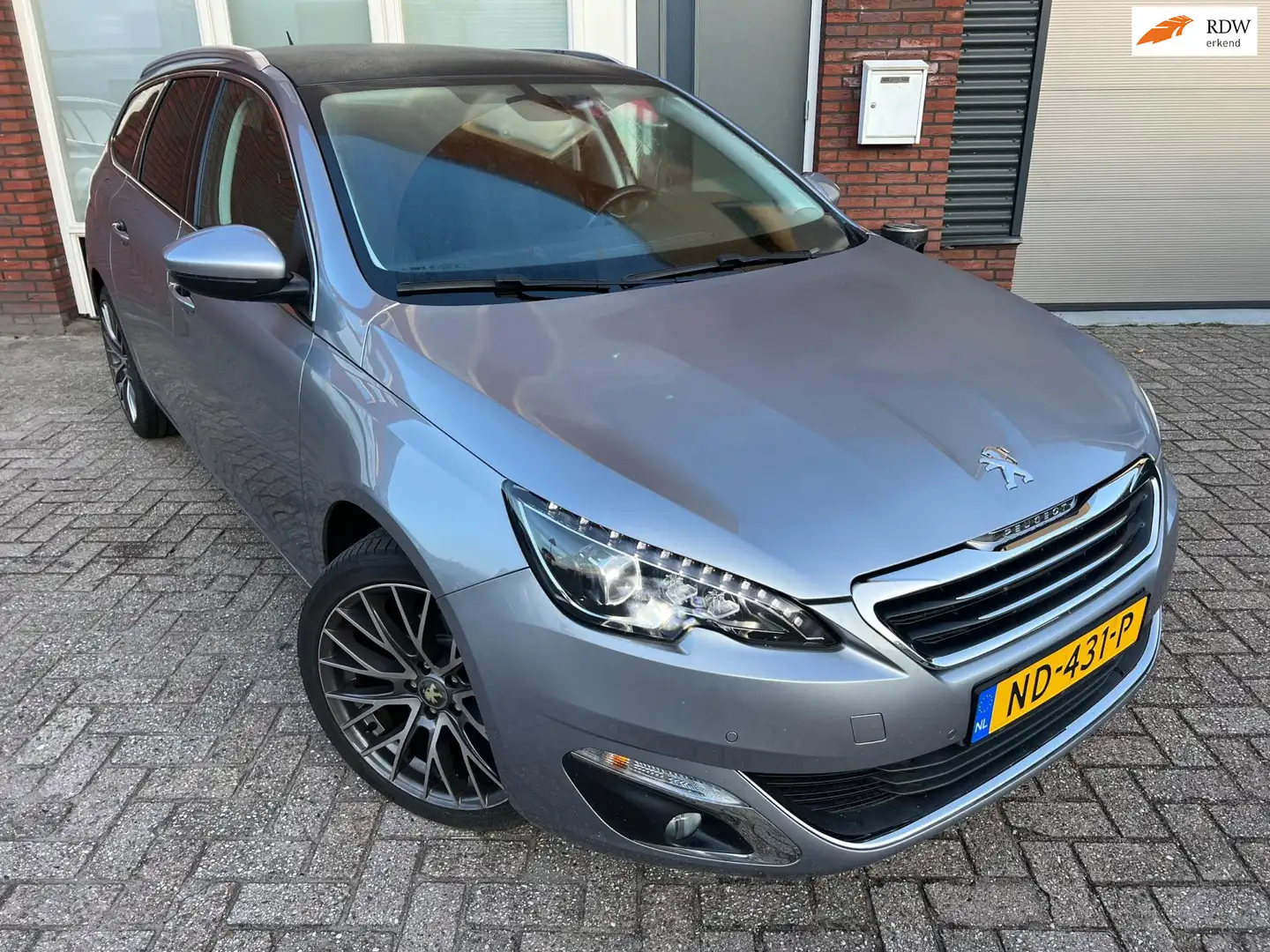 Peugeot 308 SW 1.2 PureTech Blue Lease Premium / Pano / Navi / Gris - 1