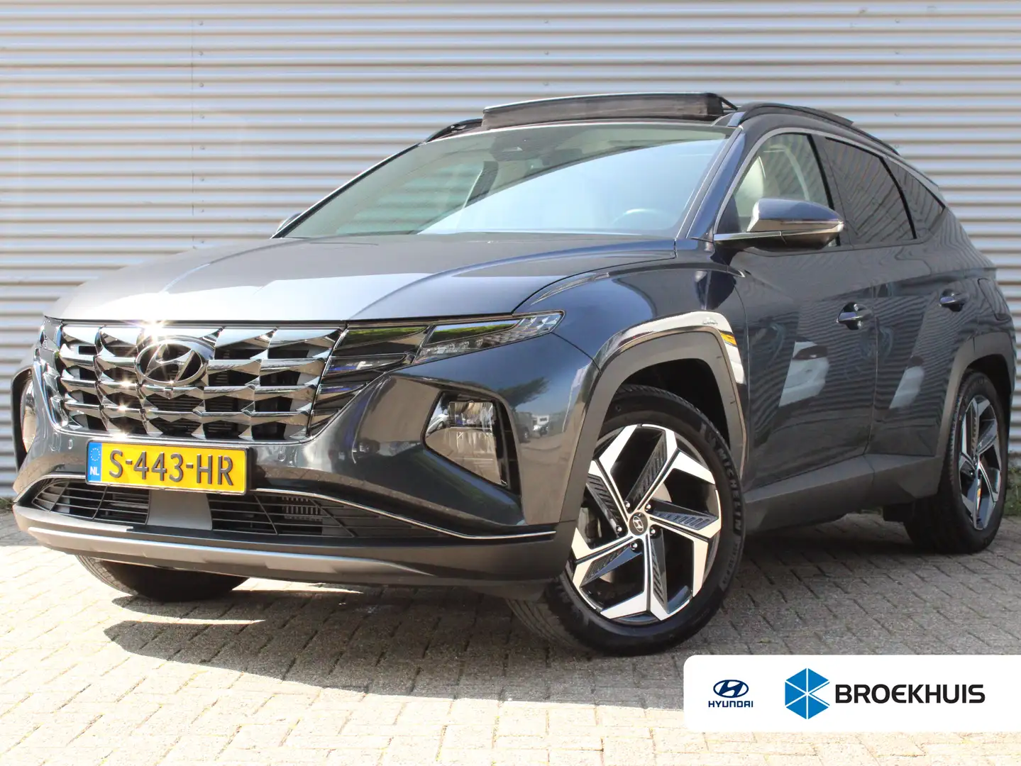 Hyundai TUCSON 1.6 T-GDI PHEV Premium Sky 4WD | Afneembare Trekha Grijs - 1