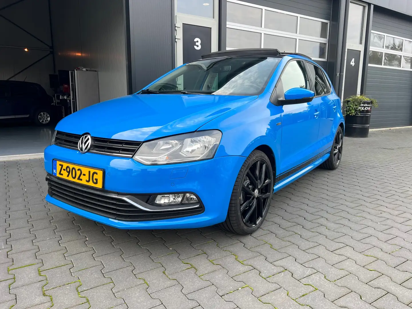 Volkswagen Polo 1.2 TSI LOUNGE !! AUTOMAAT !! Blauw - 1