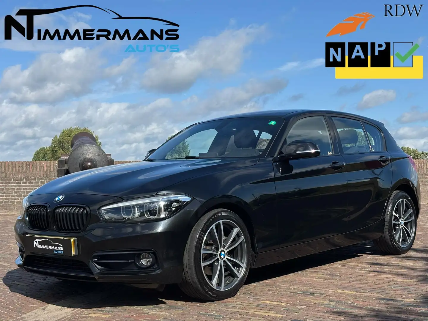 BMW 118 118i C.L. Executive | CARPLAY | NAP | BMW ONDERHDN Zwart - 1