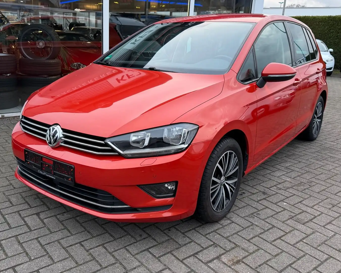 Volkswagen Golf Sportsvan / Allstar Orange - 1