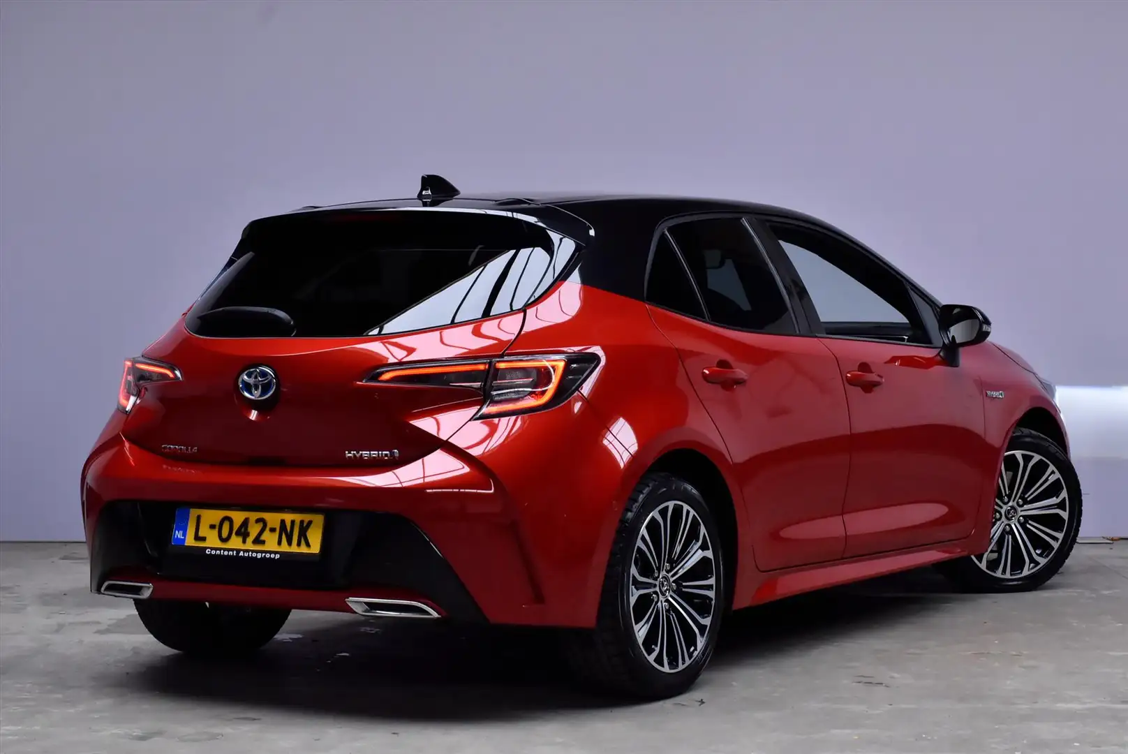 Toyota Corolla 2.0 Hybrid 180pk CVT Style | Trekhaak | Navi | Cam Rouge - 2