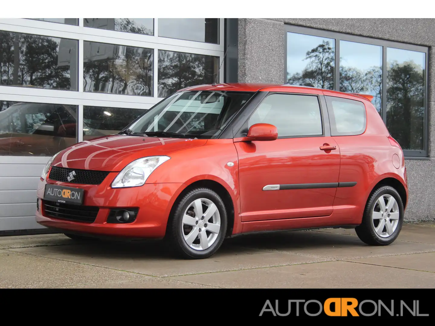 Suzuki Swift 1.3-16v Bandit 2e eigenaar Clima Keyless All Seaso Oranje - 1