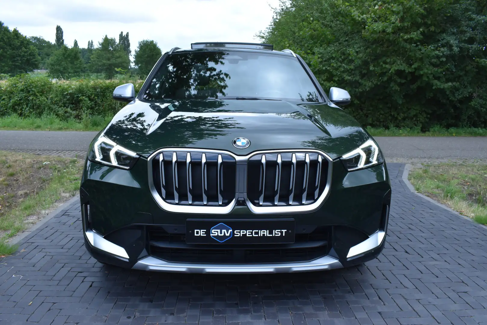 BMW X1 sDrive18i '23 FULL, LEER, PANO, ADAPT, NIEUWST. Groen - 2