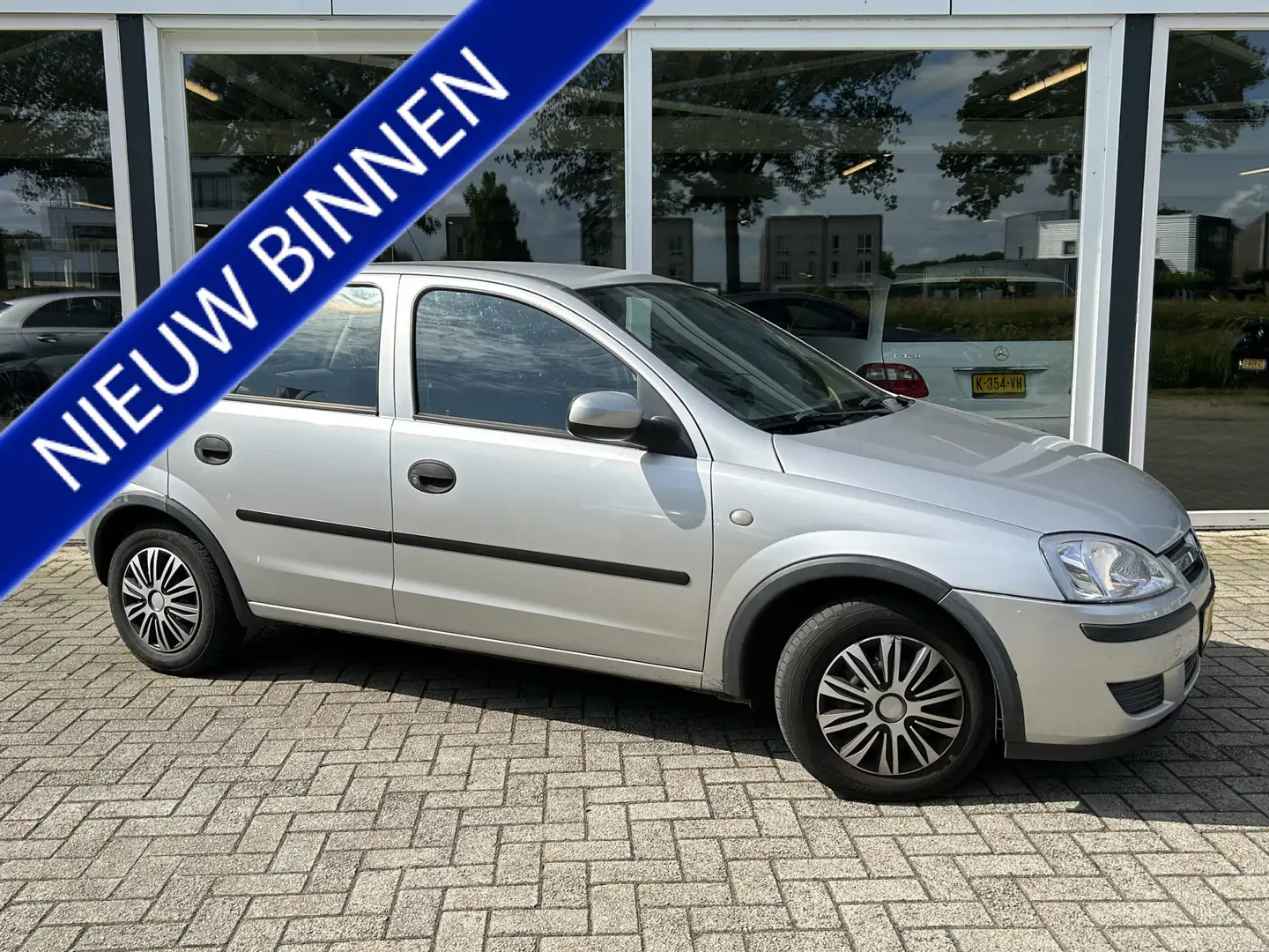 Opel Corsa 1.2-16V Essentia Airco / Elek. spiegels / 5 drs. Gris - 1