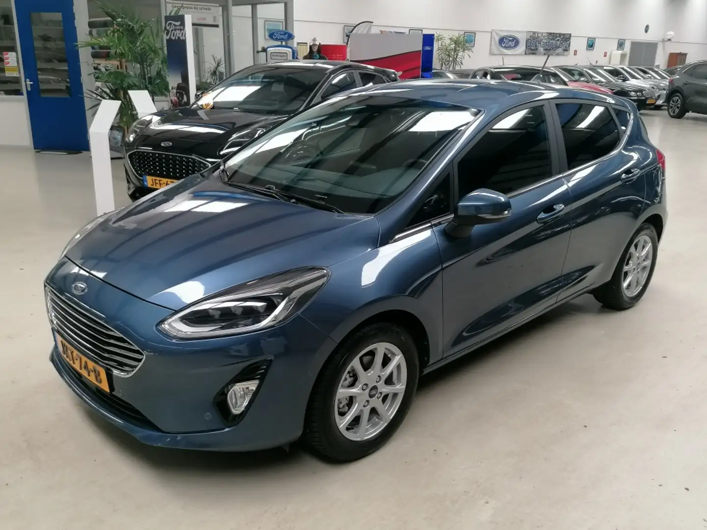 Ford Fiesta 95PK EcoB. Titanium X Blauw - 1