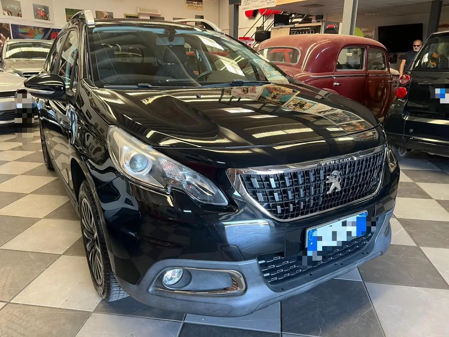 Peugeot 2008 BlueHDi 100 Allure Zwart - 2