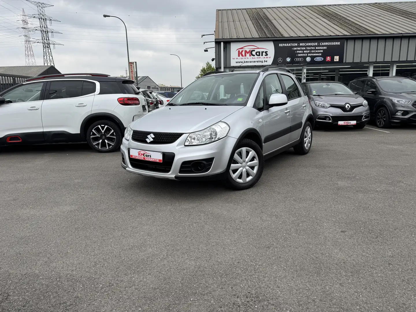 Suzuki SX4 1.5i ESSENCE // 1'ier PROPRIETAIRE / CLIMATISATION Gris - 1