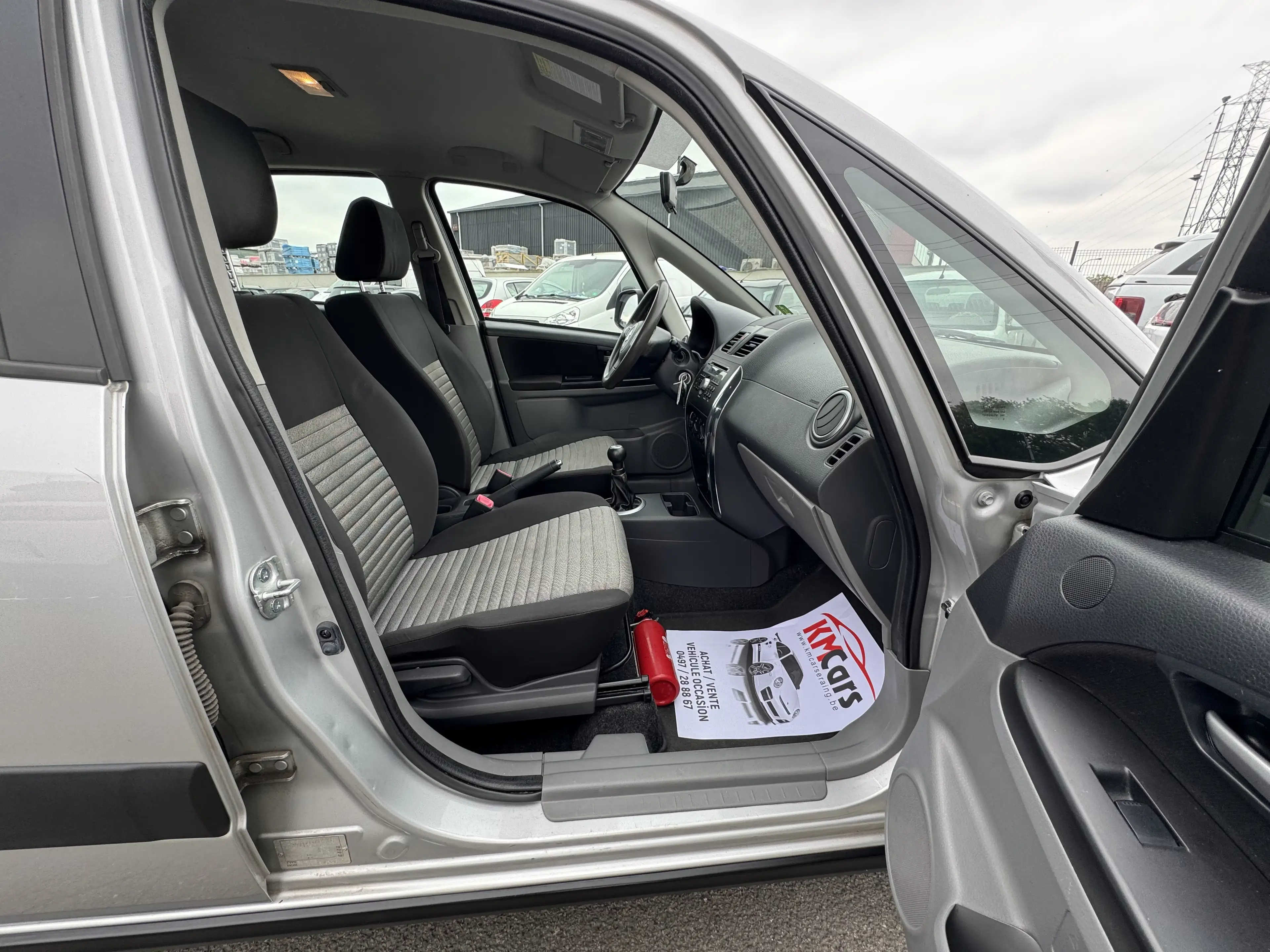 Suzuki SX4 1.5i ESSENCE // 1'ier PROPRIETAIRE / CLIMATISATION — photo 9