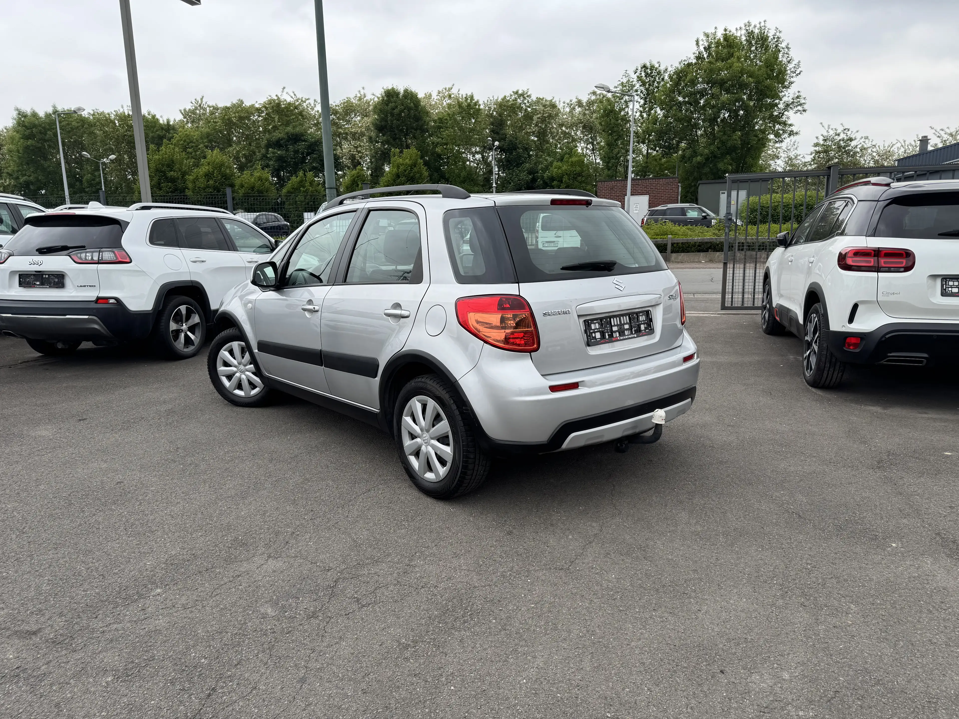 Suzuki SX4 1.5i ESSENCE // 1'ier PROPRIETAIRE / CLIMATISATION — photo 6