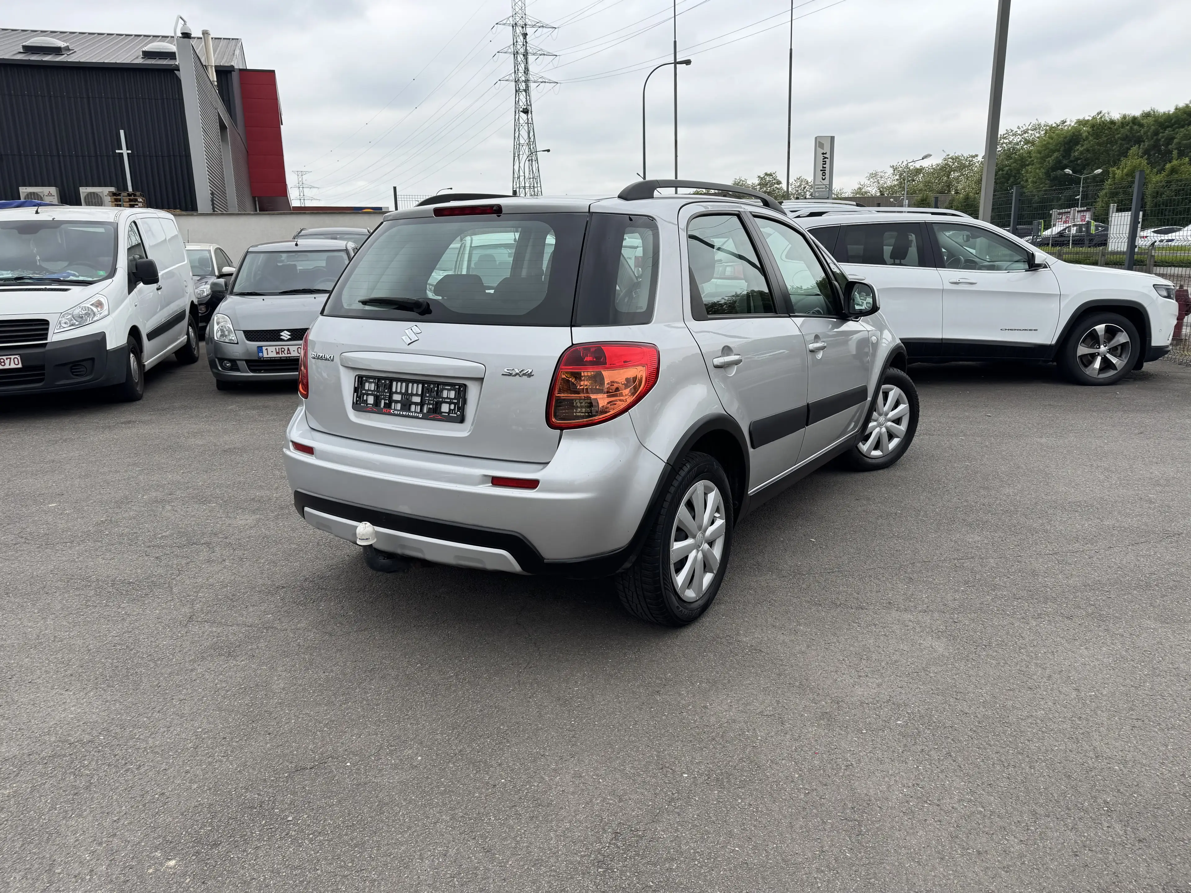 Suzuki SX4 1.5i ESSENCE // 1'ier PROPRIETAIRE / CLIMATISATION — photo 7