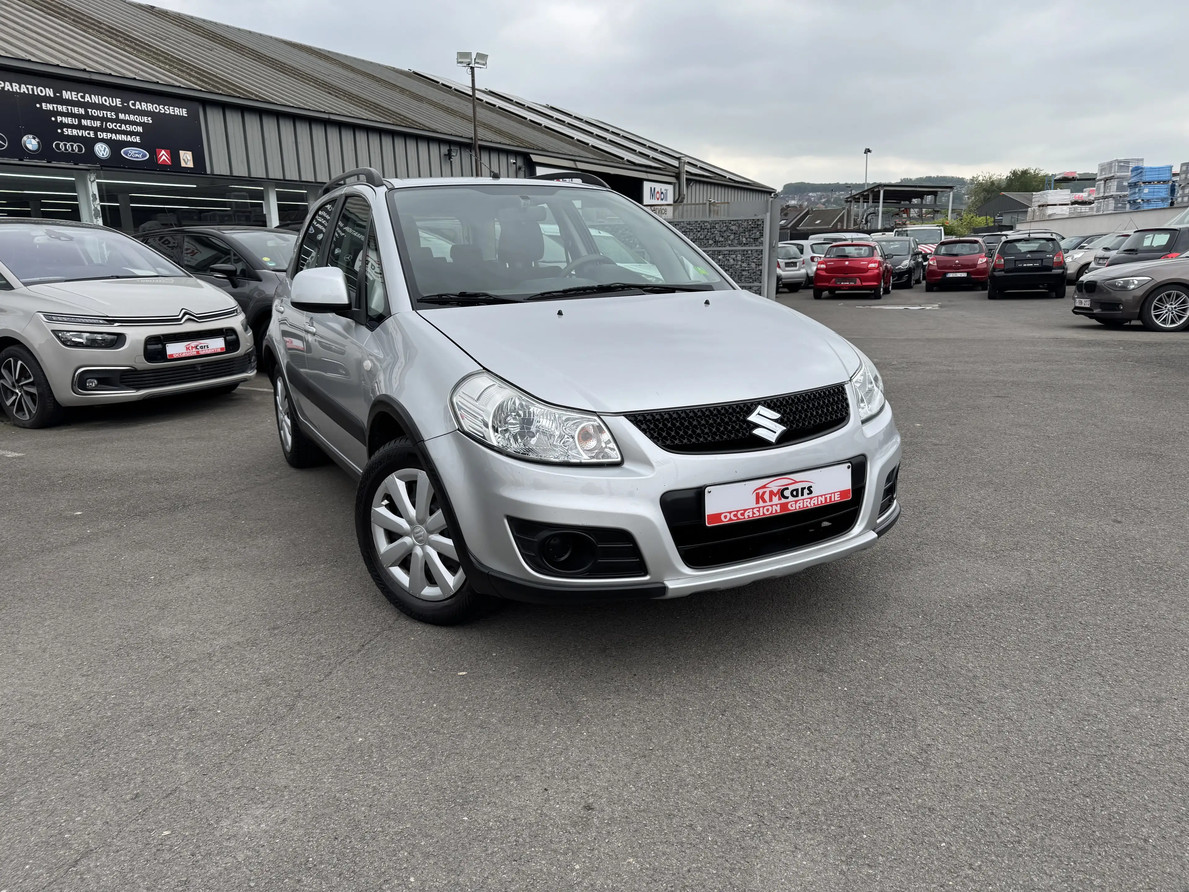 Suzuki SX4 1.5i ESSENCE // 1'ier PROPRIETAIRE / CLIMATISATION — photo 4