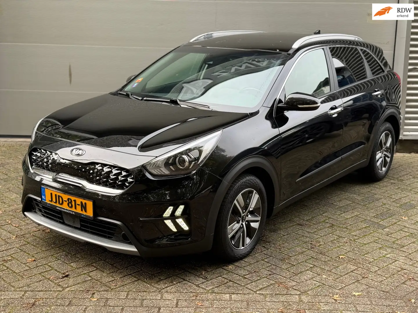 Kia Niro 1.6 GDi Hybrid ComfortLine l Volleder l Navi l Cru Noir - 1