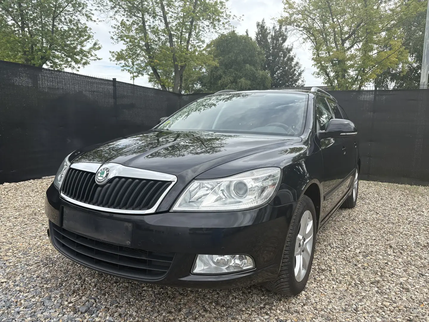 Skoda Octavia SW 1.6 CR TDi DSG ! 1e PROP - CUIR - NAVI - Eur5 Zwart - 1