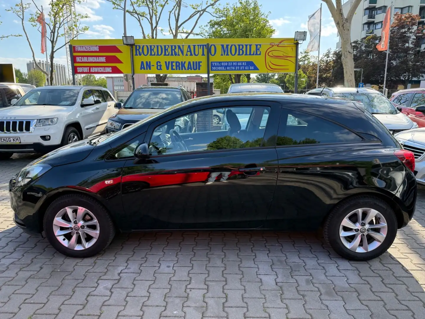 Opel Corsa E ON*SCHECKHEFT Schwarz - 2