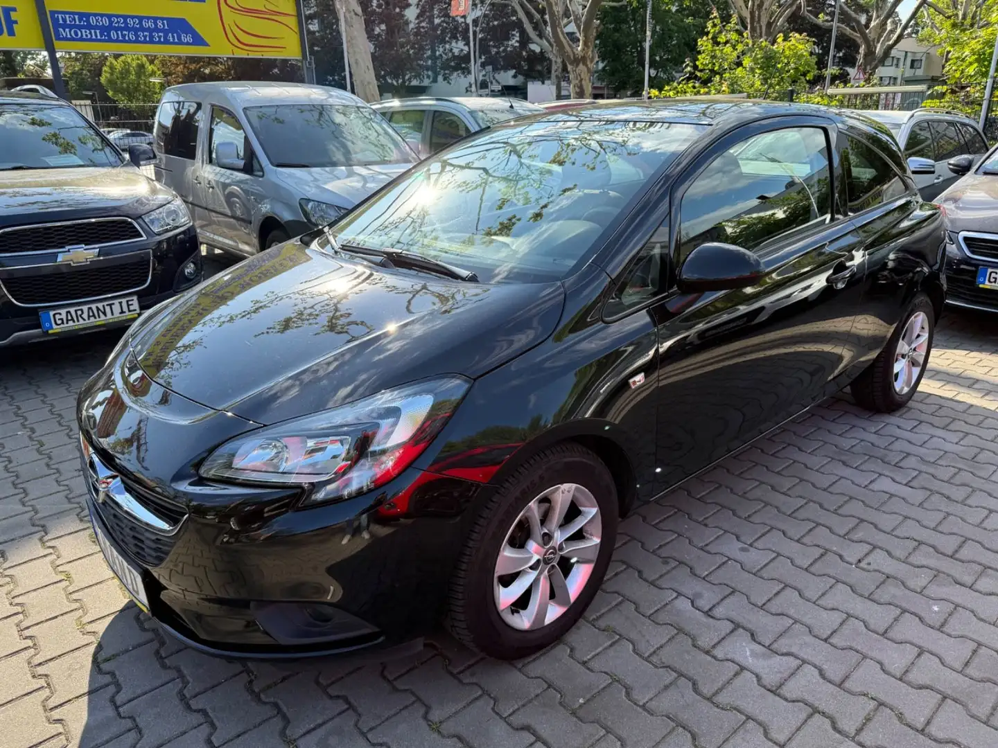 Opel Corsa E ON*SCHECKHEFT Schwarz - 1