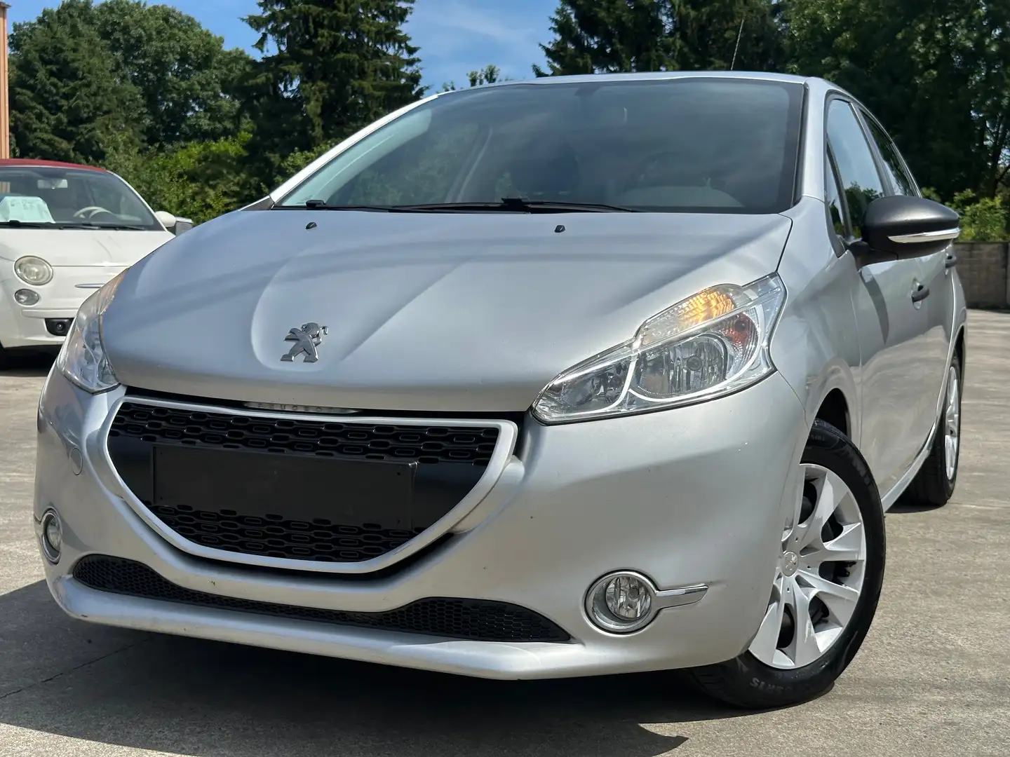 Peugeot 208 1.2i*NEW DISTRI*CARNET FULL *1ER MAiN*GARANTiE!! Grijs - 1