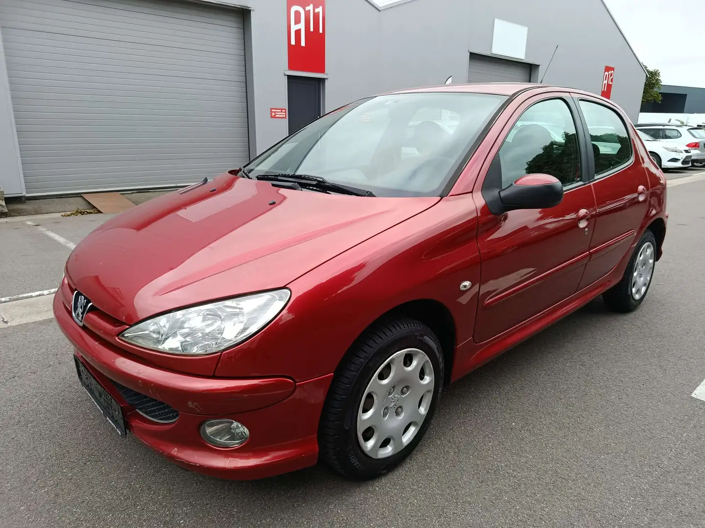 Peugeot 206 1.4 HDi Privilege 5p Airco Rosso - 1