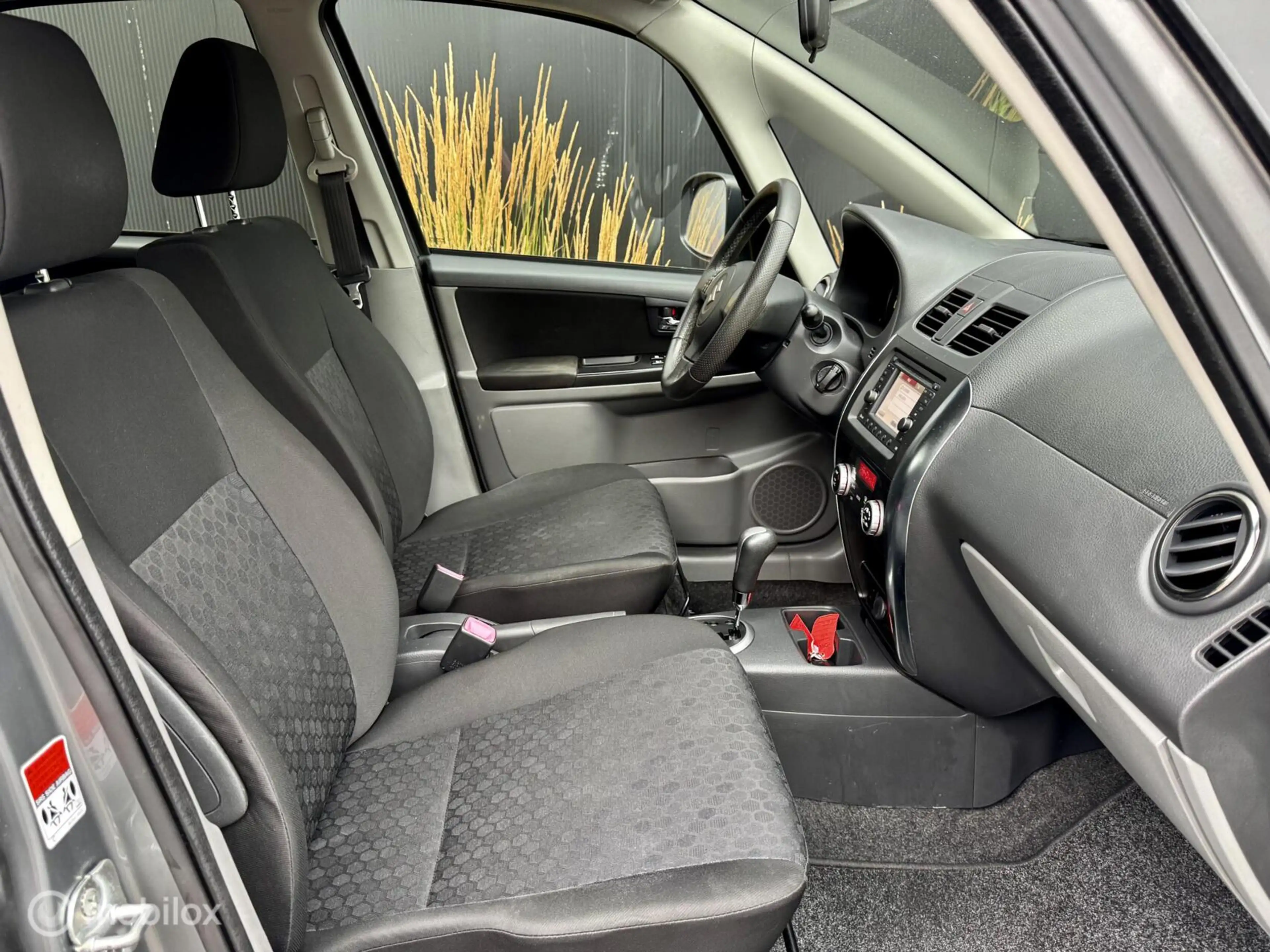 Suzuki SX4 1.6 Exclusive I Automaat I Navi I — photo 10