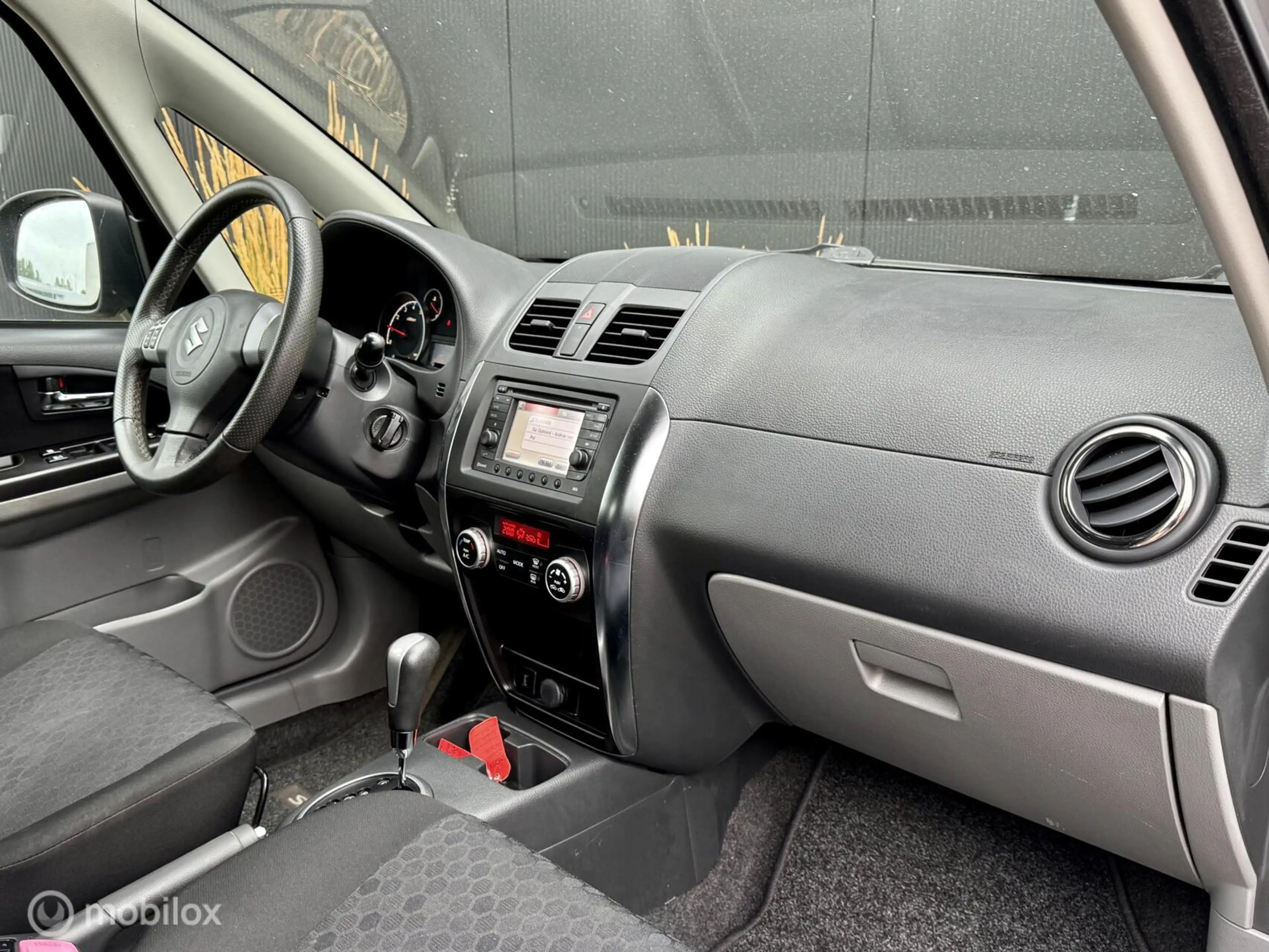 Suzuki SX4 1.6 Exclusive I Automaat I Navi I — photo 9