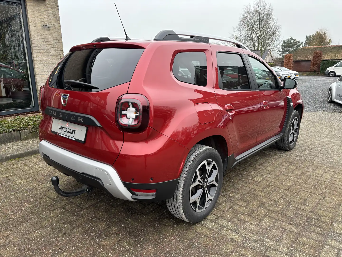 Dacia Duster 1.3 TCe Prestige Trekhaak / Navigatie / Carplay Rood - 2