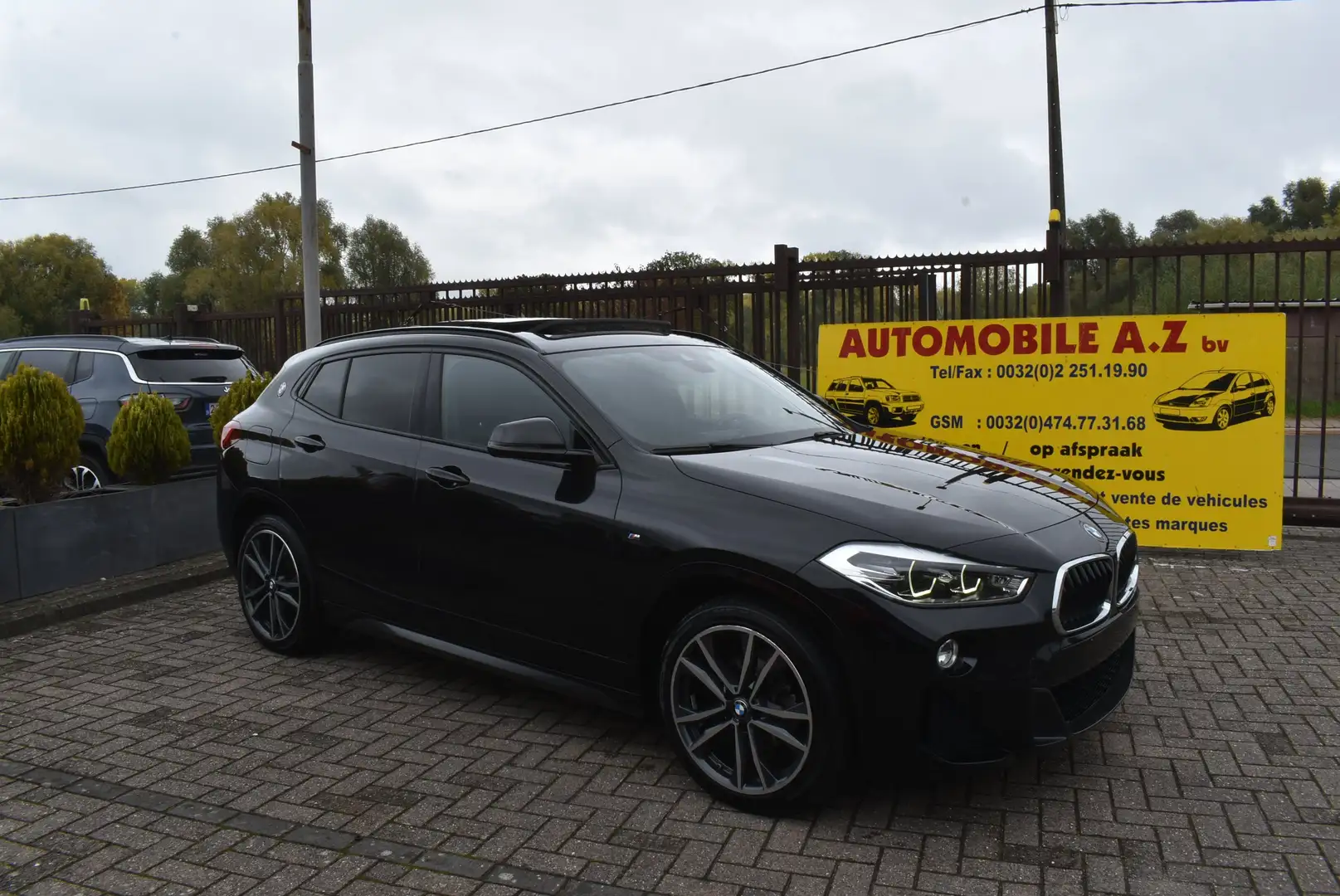 BMW X2 1.5 dA sDrive16 Pack M / Pano ***12M GARANTIE*** Zwart - 1