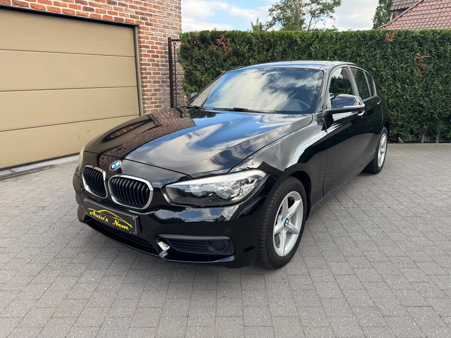 BMW 116 116i Advantage,GARANTIE,AIRCO,NAVI,CRUISE,PDC,USB Zwart - 1