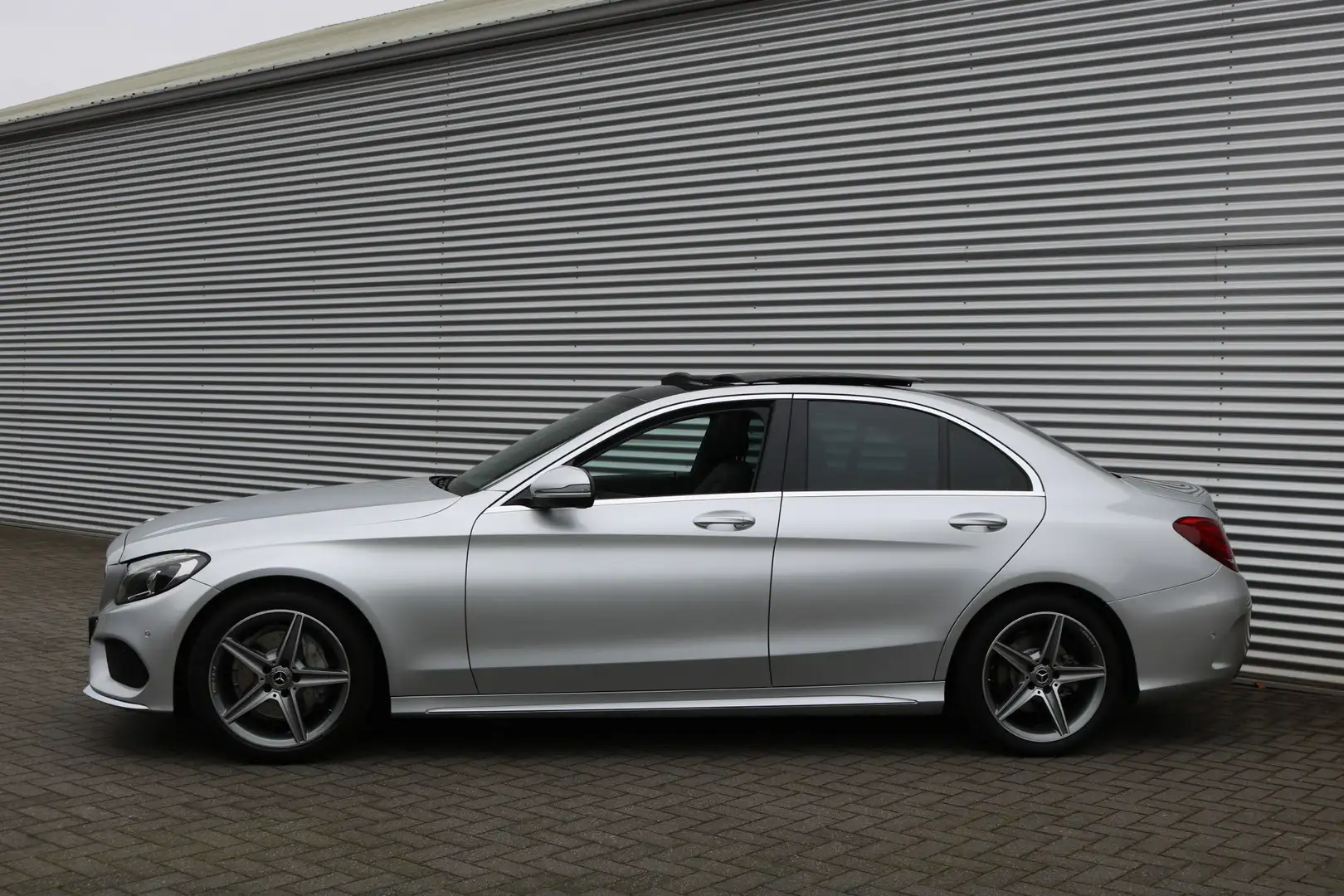 Mercedes-Benz C 180 AMG Pakket Aut (Orig NL! NAP! Panoramadak Sportled Szary - 2