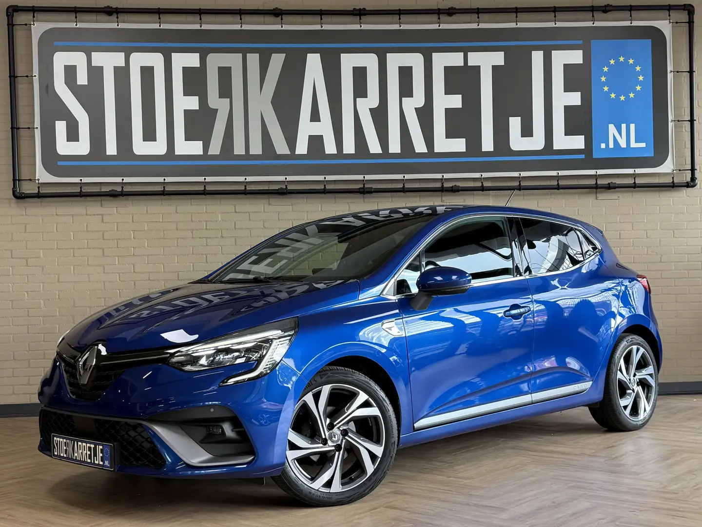 Renault Clio 1.0 TCe 100pk | R.S. Line | Groot Navi | 17" | Cam Blauw - 1