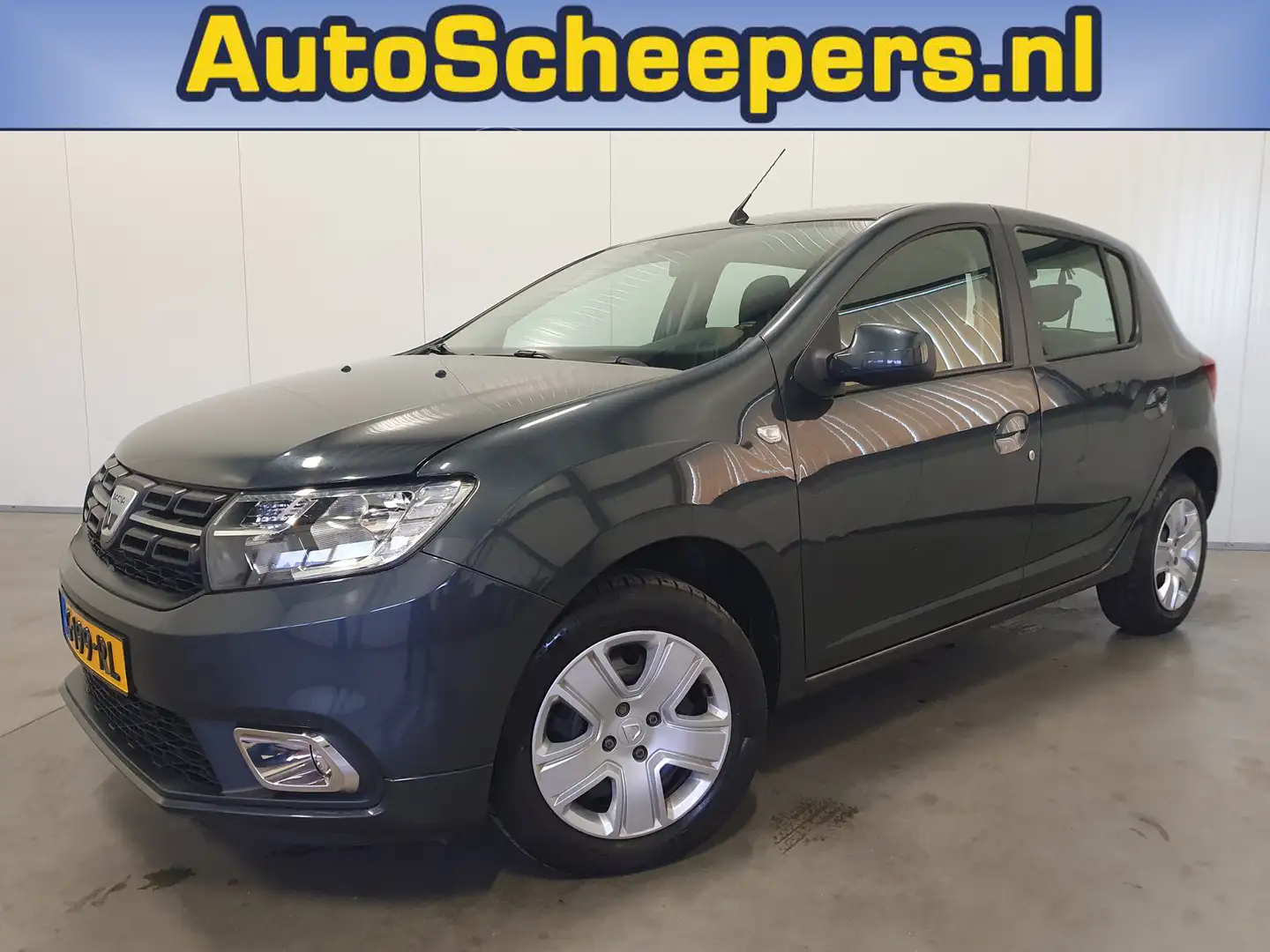 Dacia Sandero 0.9 TCe Laureate NAVI/CRUISE/PDC/AIRCO Grijs - 1