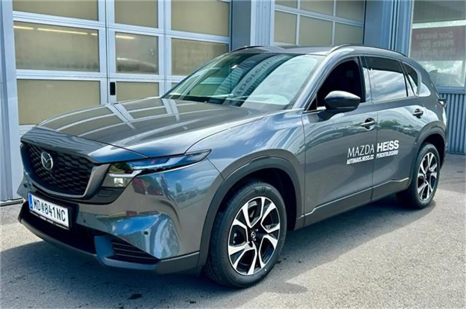 Mazda CX-5 e-Skyactiv G141 MHEV Exclusive-Line Aut. 2 WD Grau - 1