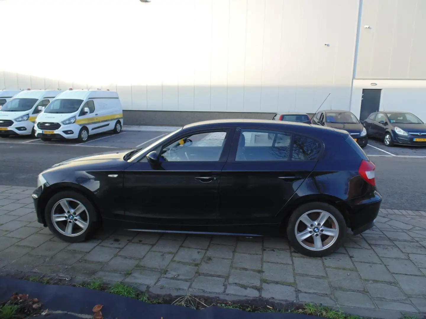 BMW 116 1-serie 116i High Executive Schwarz - 1
