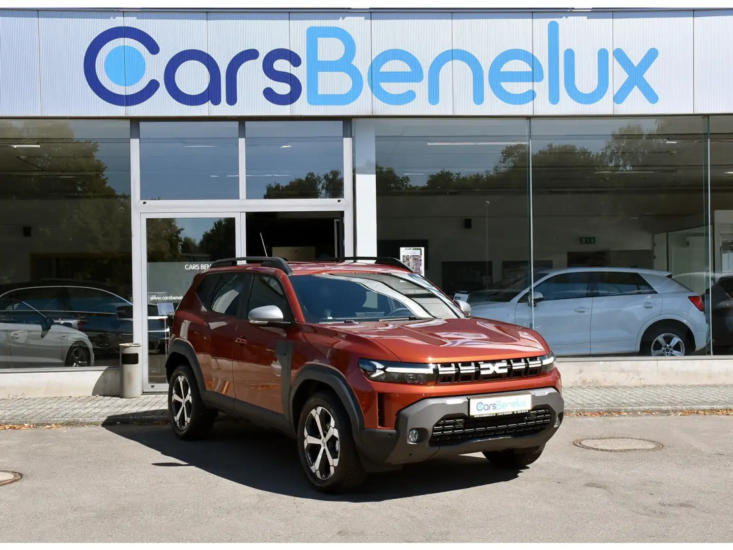 Dacia Duster 1.2 TCE Mild Hybrid 4X4 Journey SG CHF CAM360 SIDE Orange - 1