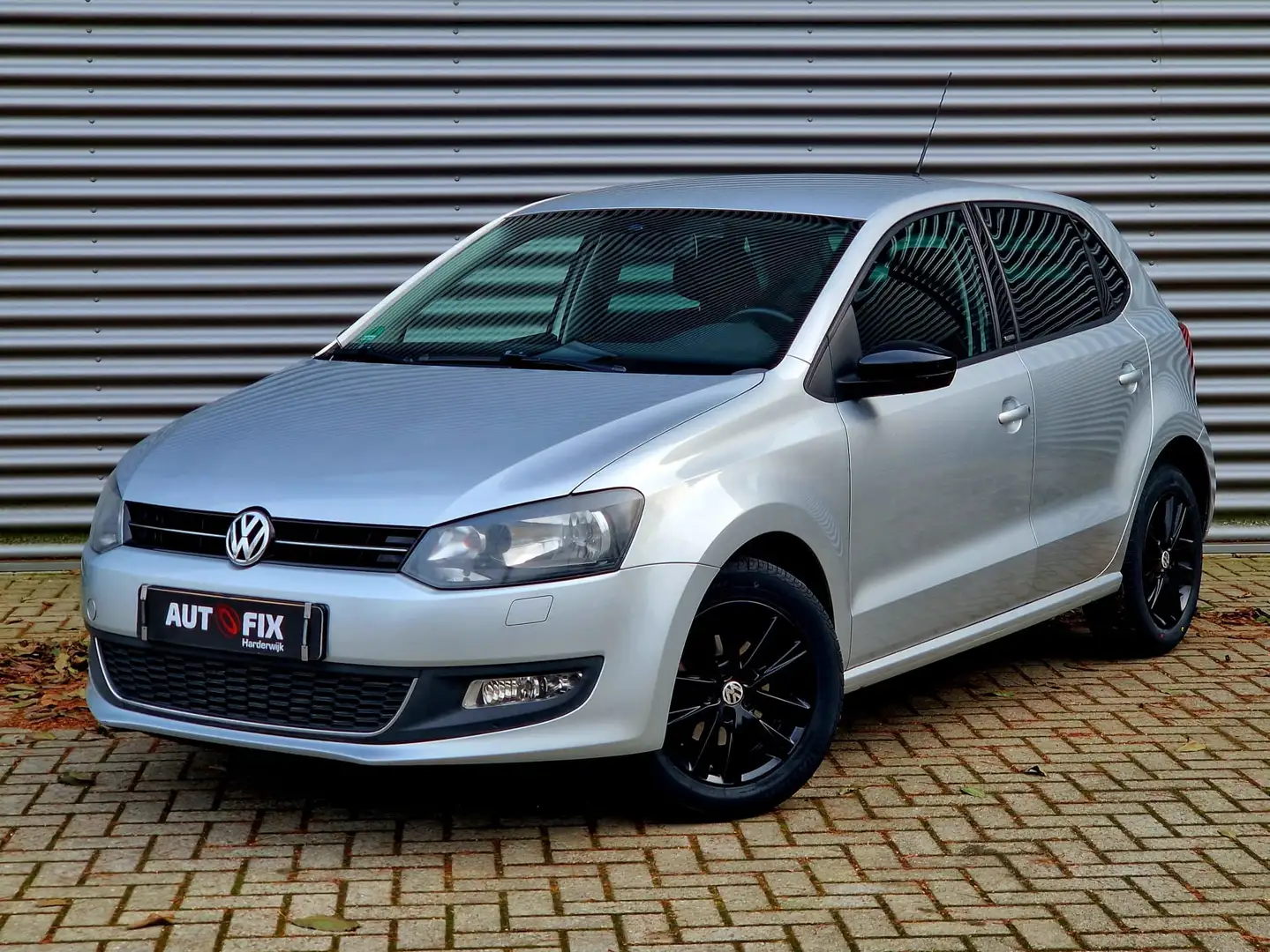 Volkswagen Polo 1.2-12V BlueMotion Trendline Grijs - 1