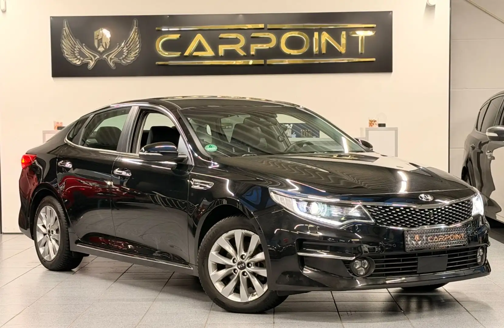 Kia Optima Spirit 1.7l/Bi-Xenon/4xSHZ/CAM/Leder/BT Schwarz - 1