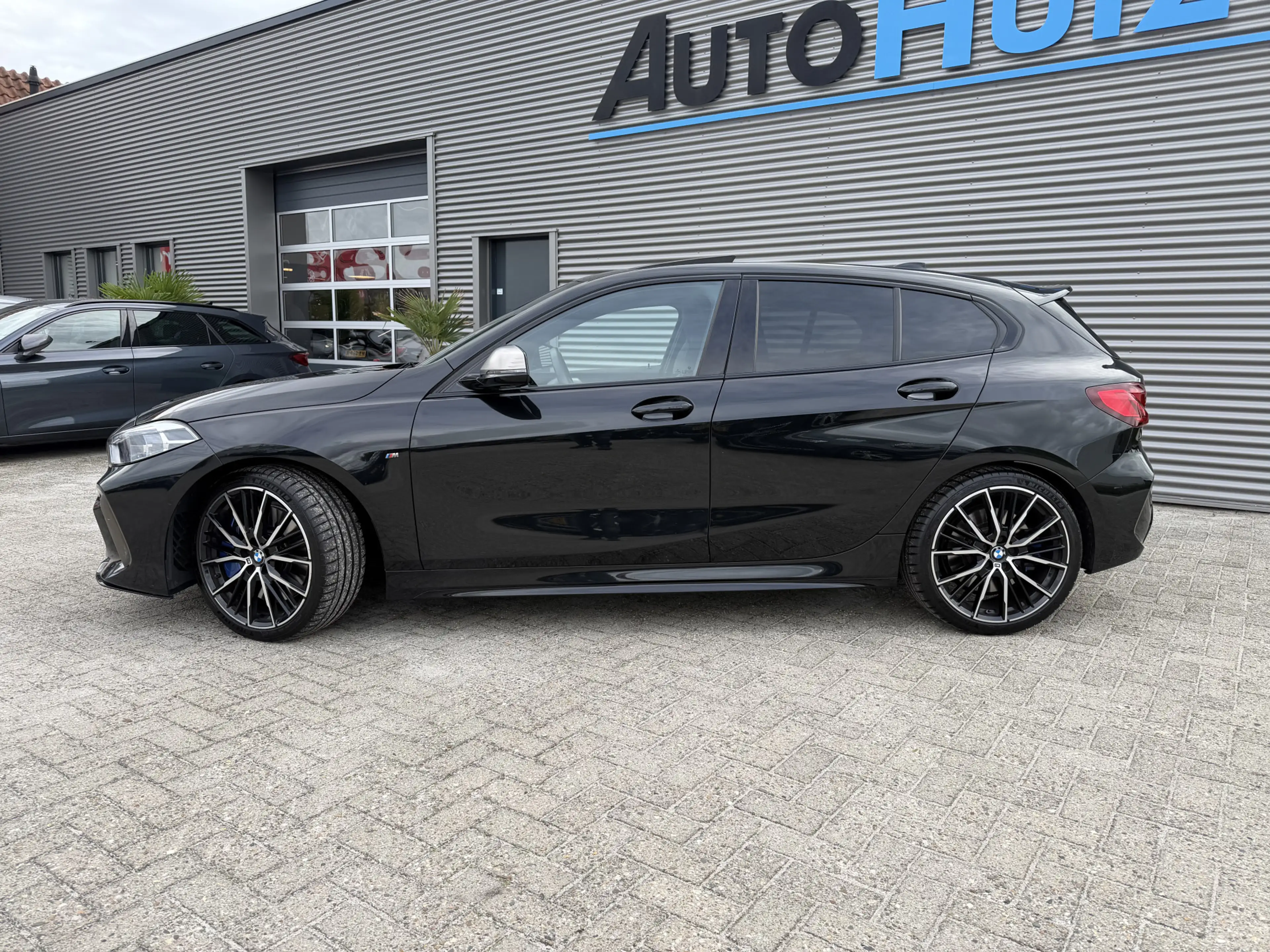 BMW 135 1-serie M135i xDrive High Executive M Sport Pano H — photo 8