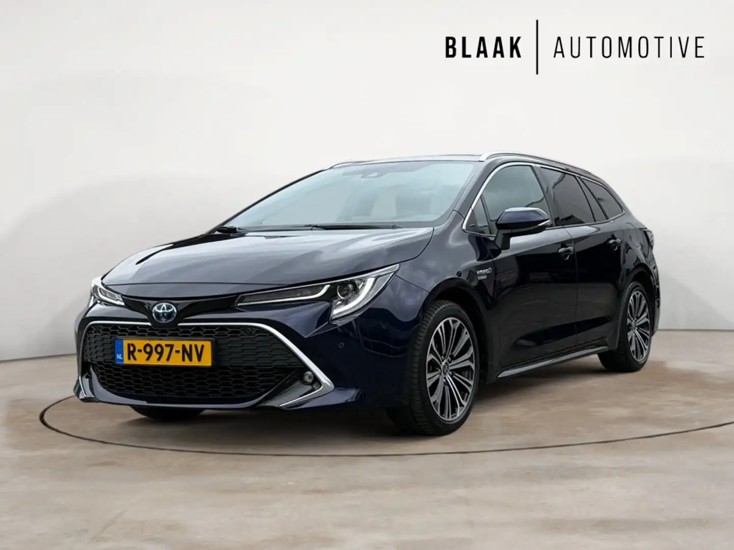 Toyota Corolla Touring Sports 1.8 Hybrid Executive Blauw - 1