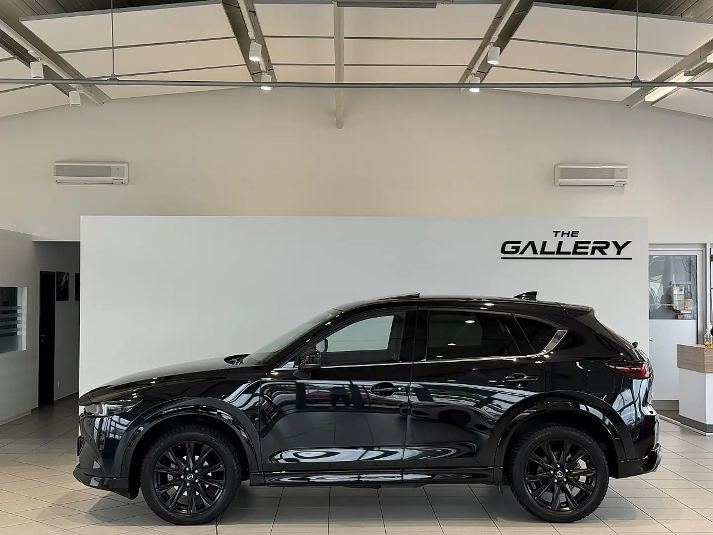 Mazda CX-5 G194 e-Skyactiv MHEV AWD Homura+ Aut.*Vollausst... Schwarz - 1