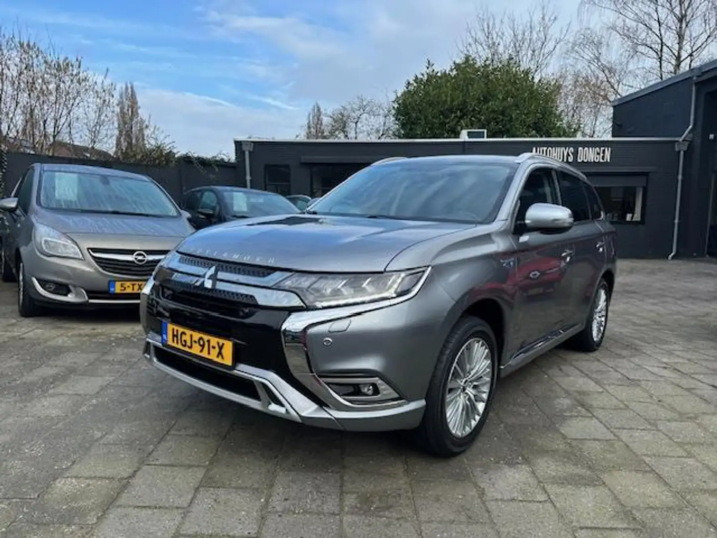 Mitsubishi Outlander 2.4 PHEV (240pk)Intense! Aut! Trekhaak! Gris - 1