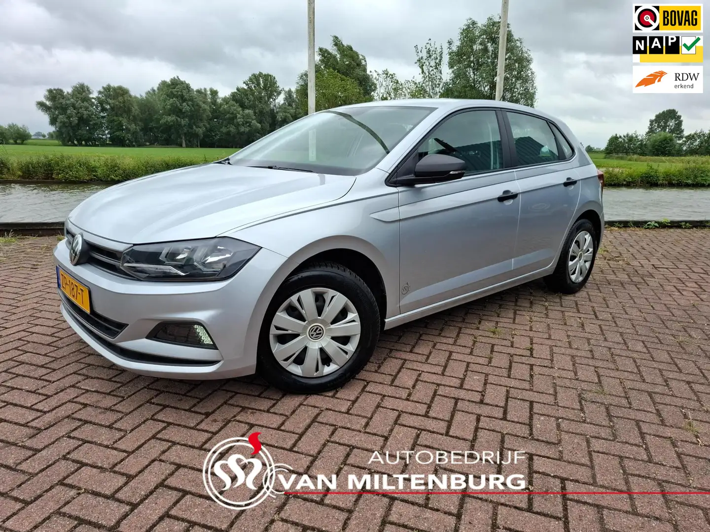 Volkswagen Polo 1.0 MPI Trendline Airco Cruise Allseason banden Is Gris - 1