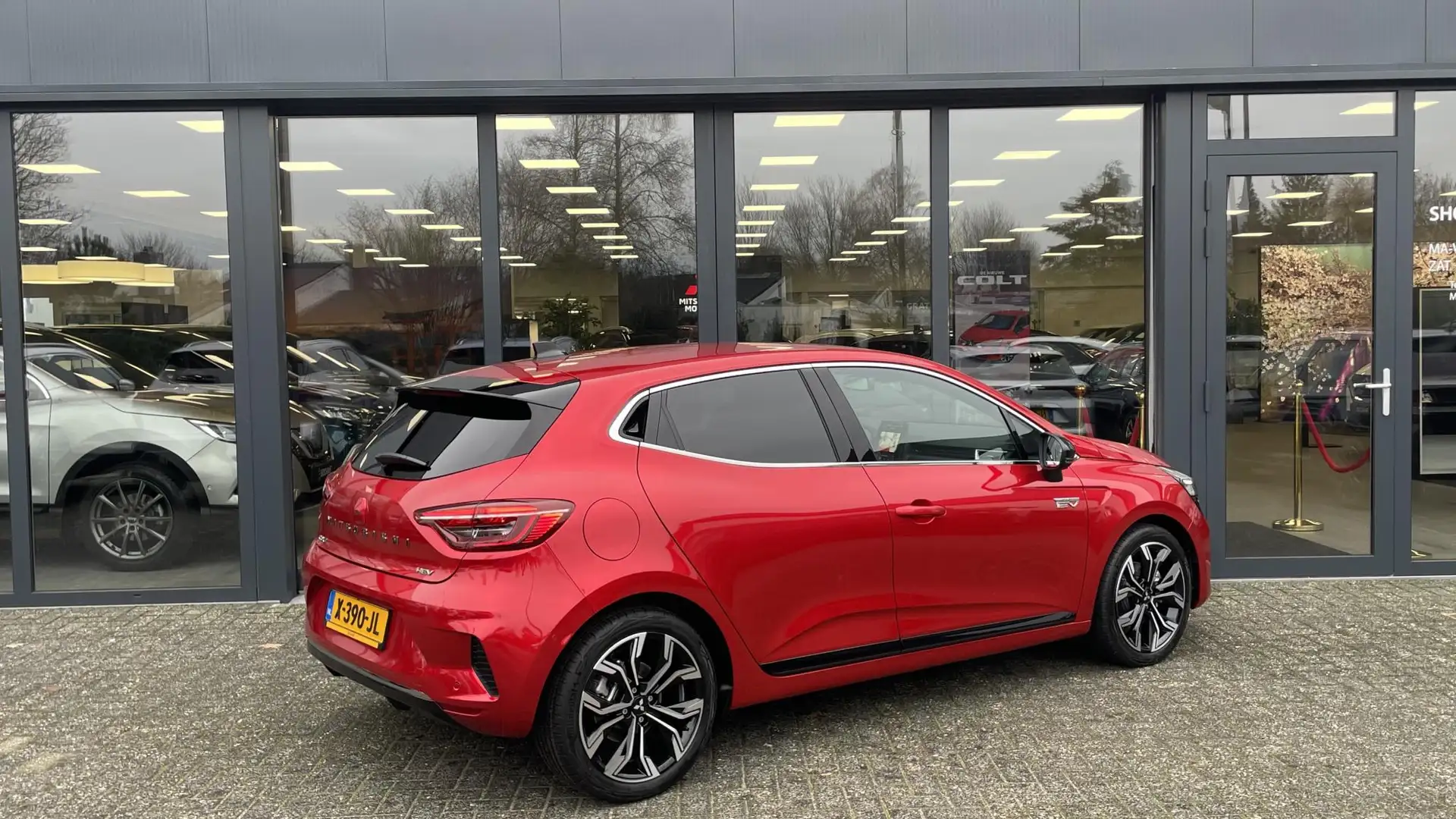 Mitsubishi Colt 1.6 HEV Instyle Hybrid | Navigatie 9,3" | Apple Ca Red - 2