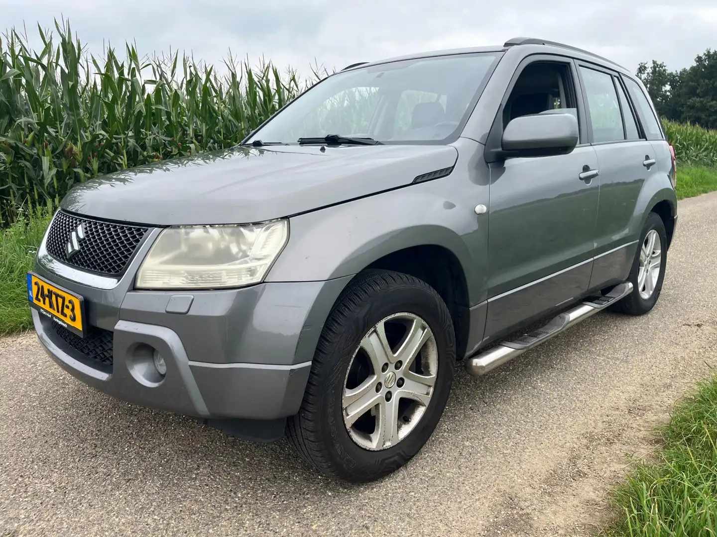 Suzuki Grand Vitara 2.0-16V High Executive |EXPORT| Grijs - 1