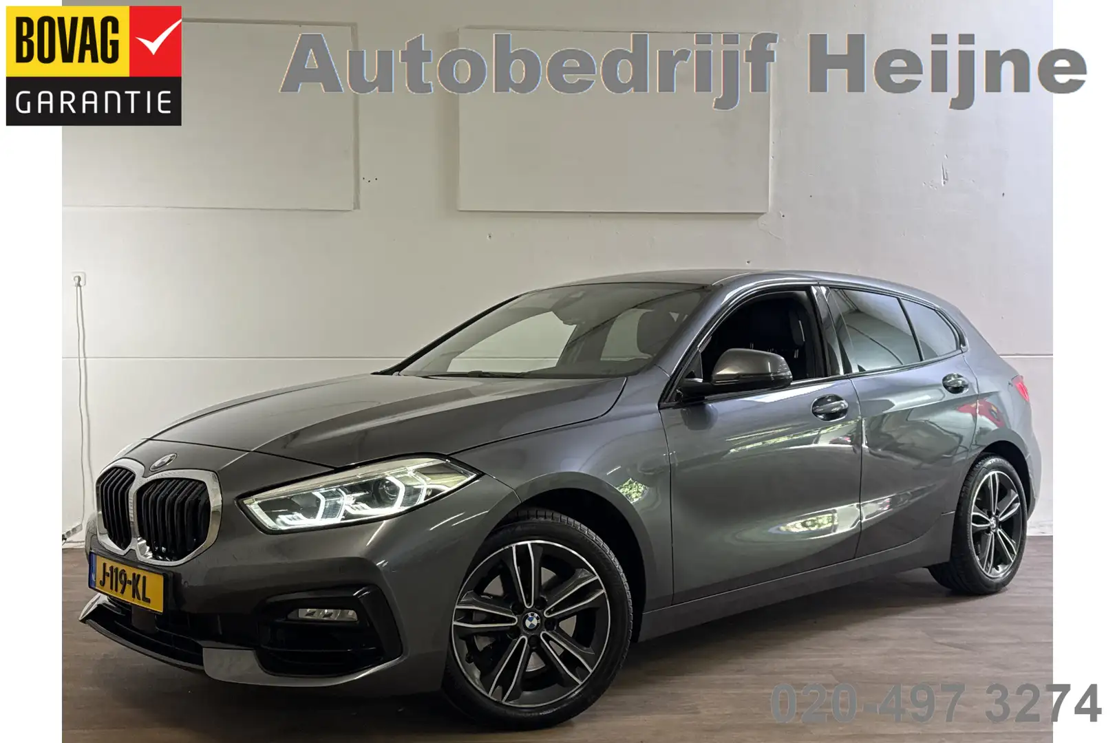 BMW 118 1-serie 118IA 140PK HIGH EXECUTIVE SPORT/NAVI/LED/ Gris - 1